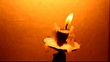 Close up of Candle with red background