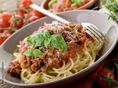 Photo: spaghetti bolognese with ragout sauce and parmesan cheese spaghetti bolognese with ragout sauce and parmesan cheese