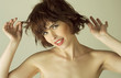 portrait of a  woman with brown short hairs