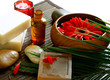 spa composition of soap, stones and flowers