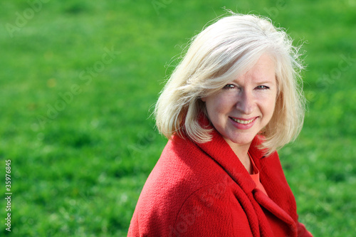 Photo: Closeup portrait of a happy mature woman Closeup portrait of a happy mature woman