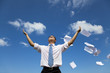 relaxed businessman throwing away papers to the sky relaxed businessman throwing away papers to the sky