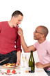 Mixed ethnicity  gay couple kitchen