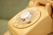 Photo: A rotary telephone on a desk. A rotary telephone on a desk.