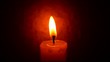Close up of Candle with red background