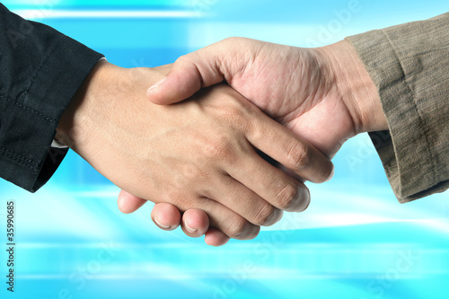 Photo: shaking hands . shaking hands .