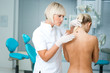 doctor examining woman skin