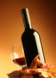 Bottle and glass of red wine