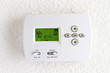 digital thermostat on white wall