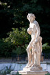 Naked young man sculpture in the park