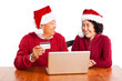 Photo: Senior Asian couple shopping online celebrating Christmas Senior Asian couple shopping online celebrating Christmas