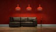 Wohndesign - Ledersofa vor roter Wand Wohndesign - Ledersofa vor roter Wand