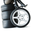 Sexy woman with High Heels sitting on a set of summer tyres