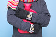 Woman holding a hot water bottle