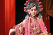 chinese opera dummy and red cloth as text space ,it is a toy,not