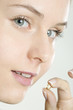portrait of woman with vitamin E