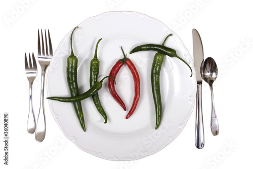 Foto: Hot chili peppers on a plate Hot chili peppers on a plate