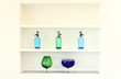 shelf.with bottles and glasses colored shelf.with bottles and glasses colored