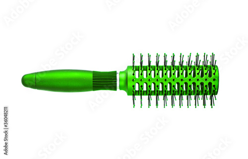 Foto: green massages comb isolated on white background green massages comb isolated on white background