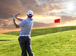 Man playing golf