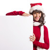 Foto: Weihnachtsfrau neben Werbetafel Weihnachtsfrau neben Werbetafel