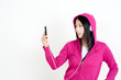 attractive asian woman listening music