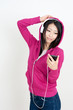 attractive asian woman listening music