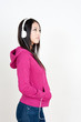 attractive asian woman listening music