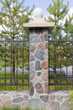 Fragment of a fence from granite stones Fragment of a fence from granite stones