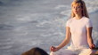 The young woman is practising the yoga. holiday relaxation.