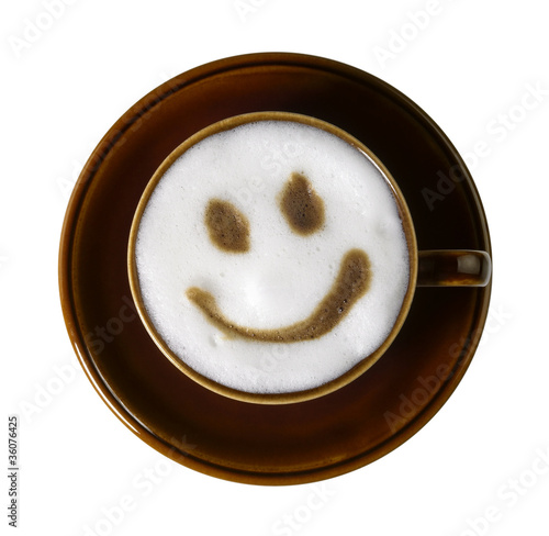 Foto: brown porcelain cup with marbled milk froth brown porcelain cup with marbled milk froth