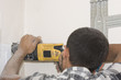 Technician air conditioning. Drill.