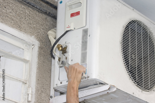 Photo: A residential central air conditioning unit A residential central air conditioning unit