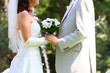 Newly-married couple keeps for hands and in hands