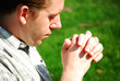Young man praying