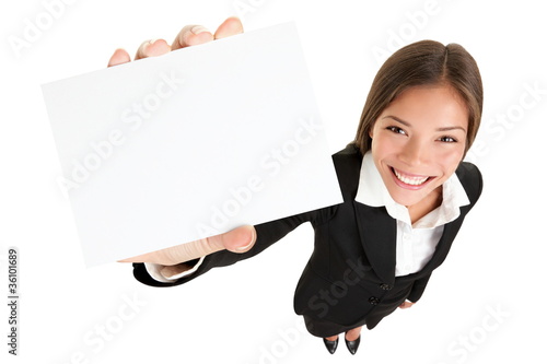 Photo: Showing sign - business card woman Showing sign - business card woman
