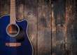 Guitar on rustic wood background