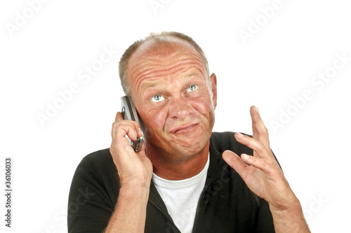 Photo: Bored man on the phone Bored man on the phone