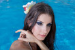 The beautiful girl in pool