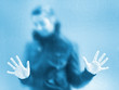 Foto: Silhouette of a girl through frosted glass Silhouette of a girl through frosted glass