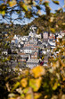 Blick druch Blätter auf Häuser in Idar-Oberstein Blick druch Blätter auf Häuser in Idar-Oberstein