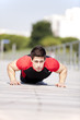 Athlete man making pushups Athlete man making pushups