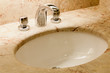 Faucet with handles and white sink