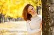 Young woman in autumn park