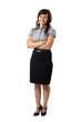 Portrait of a confident young business woman standing with folde