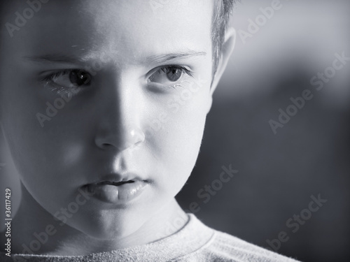 Photo: Little boy getting out of the darkness Little boy getting out of the darkness