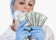 Doctor holding money