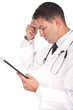doctor with his hand in his head and looking worried