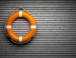 Lifebuoy attached to a wooden wall