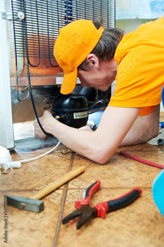 Photo: repair work on fridge appliance repair work on fridge appliance